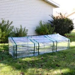 Sunnydaze Decor Sunnydaze Outdoor Portable Slanted Top Plant Shelter Mini Cloche Greenhouse With Zipper Doors - Clear -Sunnydaze Decor GUEST 167877ed 4a69 446b b207 86e9ed75512c