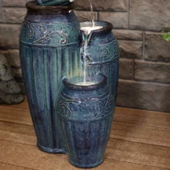 Sunnydaze Decor Sunnydaze 27"H Electric Ceramic Dark Turquoise Tour De Vase Outdoor Water Fountain With LED Lights -Sunnydaze Decor GUEST 28213bc9 e4f5 40bd 82eb 0dbd55d24f96