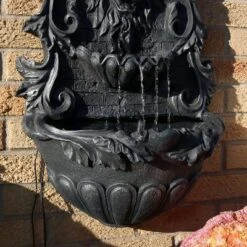 Sunnydaze Decor Sunnydaze 30"H Solar-Powered With Battery Pack Polyresin Stoic Courage Lion Head Outdoor Wall-Mount Fountain -Sunnydaze Decor GUEST 795e7d2d 0d1f 4b45 8652 51214d2dd83a