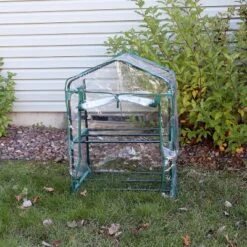 Sunnydaze Decor Sunnydaze Outdoor Portable Growing Rack 2-Tier Greenhouse With PVC Roll-Up Door - 2 Shelves - Clear