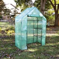 Sunnydaze Decor Sunnydaze Outdoor Portable Tiered Growing Rack Deluxe Walk-In Greenhouse With Roll-Up Door - 4 Shelves - Green -Sunnydaze Decor GUEST f969f2a3 504a 4947 882e 2b1f77104888