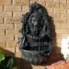 Sunnydaze Decor Sunnydaze 30"H Solar-Powered With Battery Pack Polyresin Stoic Courage Lion Head Outdoor Wall-Mount Fountain